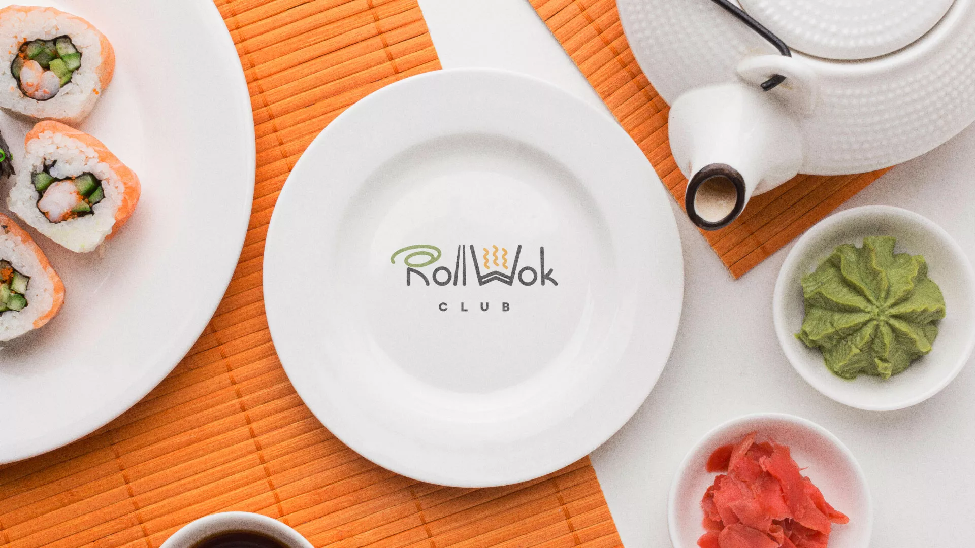 Разработка логотипа и фирменного стиля в Ханты-Мансийске для суши-бара «Roll Wok Club» Разработка логотипа и фирменного стиля в Ханты-Мансийске для суши-бара «Roll Wok Club»